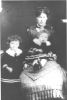 Children believed to be Annie standing & Fred on Margaret James' lap.